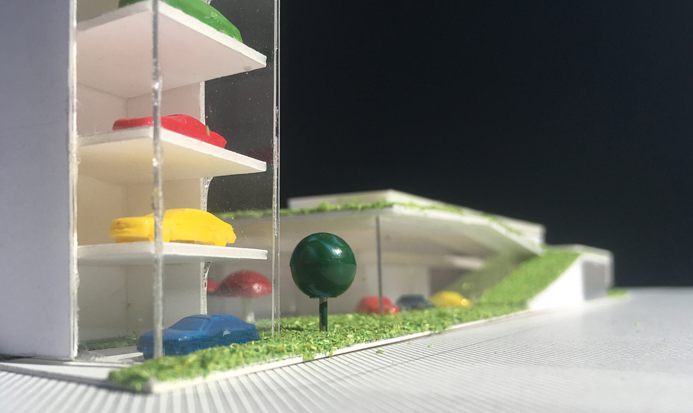 これまでにない新しい自動車ショールーム：緑の丘でクルマを愉しむイメージ模型（前面道路より見る）
